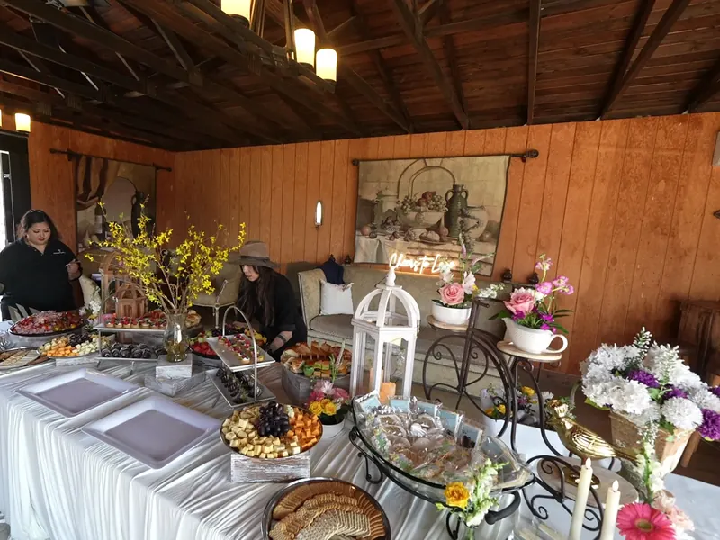 Drop-off dinner trays set up on a counter with serving utensils