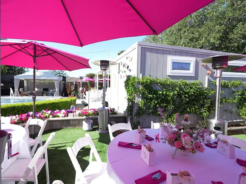 Custom bloom bar with buckets of stems guests can arrange