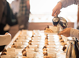 Pouring coffee for brunch catering bay area