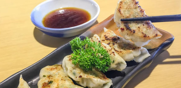 Chinese dumplings with parsley for finger food cater near danville